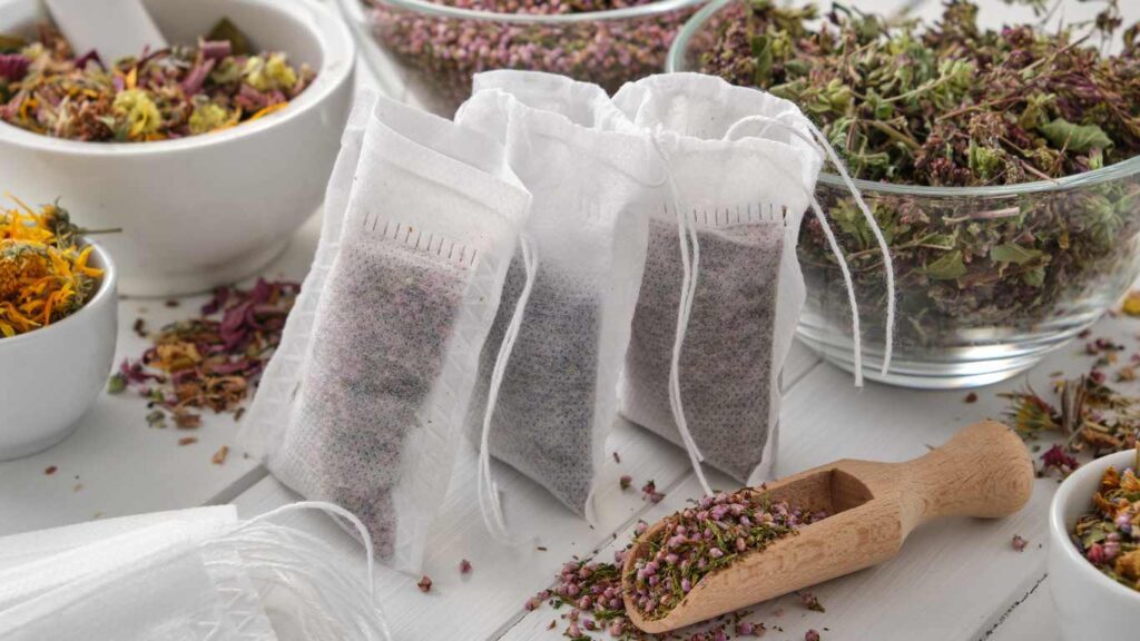 Blog title-Liver Detox Tea: Your Complete Guide. Image is of dried herbs and tea sachets.